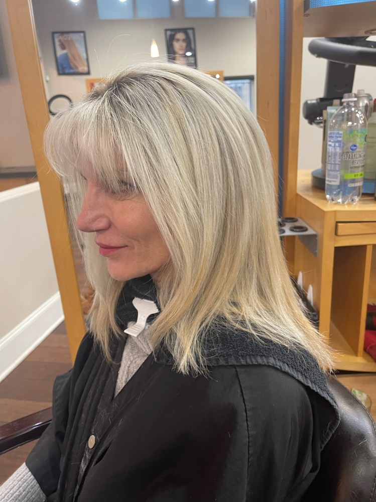 Women's haircut and blow-dried style at Precise Color N Cut in Alpharetta, Georgia